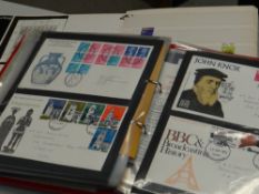 Two stamp albums containing loose & some first day covers