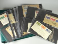AN ALBUM OF FIRST DAY COVERS particularly relating to the 12th May 1937 coronation of King George