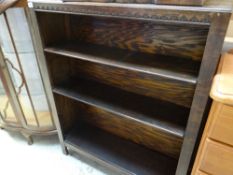 A stained pine bookcase