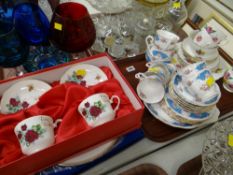 A tray of English bone china teaware in two different patterns together with a boxed pair of cup &