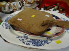 Collection of vintage Staffordshire platters together with a Mouseman-style cheese board with the