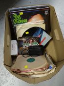 A box containing small collection of LPs & several other records together with two vintage cameras
