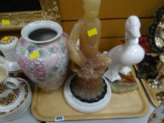 Tray of various stone eggs, onyx dishes etc