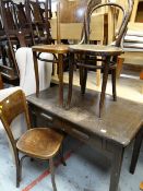 A vintage two-drawer table by Abbess together with three bentwood chairs