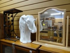 A large white ceramic elephant plant holder together with a metal stand & a small modern dressing