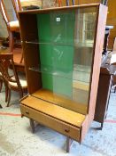 A vintage Turnidge teak small display cabinet with single-drawer & on raised feet