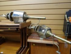 A pair of decorative brass wall mounted lanterns