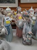 Three Lladro figures of young girls