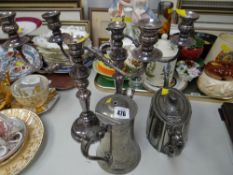 A pair of electroplate candelabra together with a teapot & coffee pot