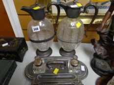 Two plated wine jugs together with an EPNS desk & inkstand