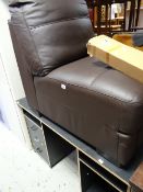 A brown leather effect padded chair together with a modern black ash desk