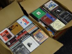 Two boxes of CDs