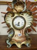Elaborately decorated porcelain mantel clock