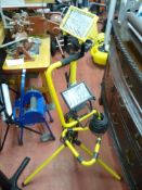 Floorstanding tripod halogen floodlight and another smaller E/T