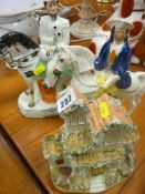 Staffs flatback ornaments 'Lord Raglah', 'Tom King' and a cottage ornament