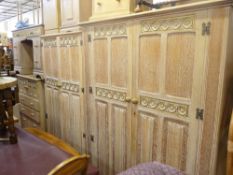 Excellent limed oak bedroom suite by Crown Furniture comprising twin wardrobes, chest of drawers,