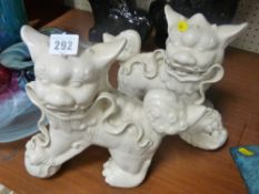 Pair of Blanc de Chine temple lions