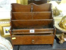 Stationery rack with base drawer