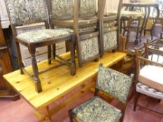 Pine table and six polished wood and classical upholstered chairs