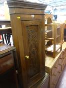 Carved front wall hanging corner cupboard