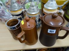 Collection of stoneware vessels including three German steins
