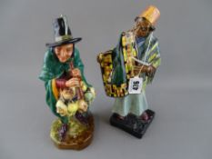 Two Royal Doulton figurines titled 'Carpet Seller' HN1464 and 'The Mask Seller' HN2103