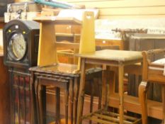 Nest of three walnut effect glass topped coffee tables, square topped occasional table and an Arts &
