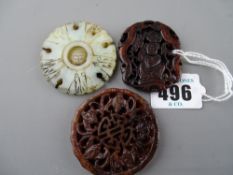 Three 20th Century carved jade Oriental roundels