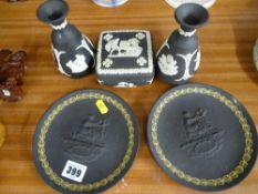 Five items of black Wedgwood Jasperware