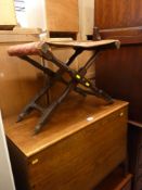 Polished wood blanket box and an 'X' framed upholstered seat chair