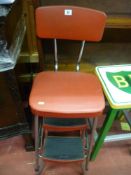 Red Prestige seat with two steps below