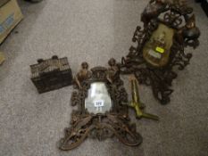 Pair of cherub decorated metallic picture frames, brass tap and similar items