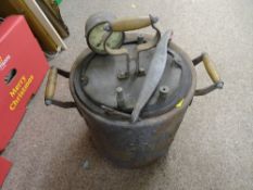 Heavy metallic cookpot with label 'Pentecon'