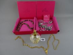 Two modern boxed necklaces by Pia, a gold coloured vintage necklace and a brass topped glass perfume
