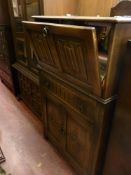 Cocktail cabinet with centre drawer and two door base cupboard