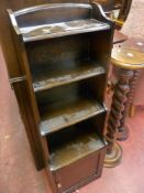 Four shelf slim bookcase with base cupboard