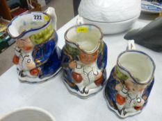 Graduated trio of Toby jugs