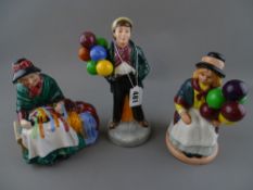 Two Royal Doulton figurines 'Balloon Boy' HN2934 and 'Balloon Girl' HN2818 with one other figure