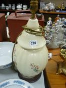 Pair of brass effect decorative table lamps and a porcelain lamp