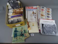 Collection of military interest postcards, photographs, cigarette cards and ephemera