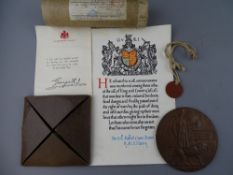 World War I death plaque with scroll, tag and Buckingham Palace note for Robert Owen Evans, HMS