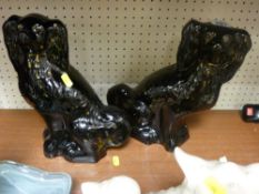 Pair of black Staffs dogs