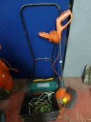 Flymo Multi-trim strimmer and a small manual lawnmower E/T