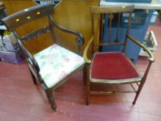 Polished wood elbow chair with carved back and upholstered pad and another polished chair with red