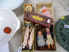 Three dressed vintage dolls, two porcelain head vintage dolls and a fancy box of soaps