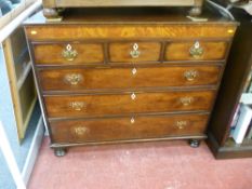Mahogany inlaid chest of three small over three large drawers