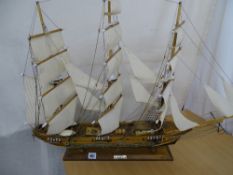 Table model of a fully rigged threemasted sailing ship on stand