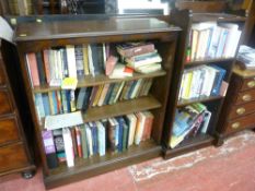 Pair of polished wood bookcases with quantity of books