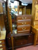 Dark wood corner entertainment unit, small chest of three drawers and a mahogany standard lamp