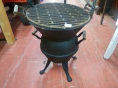 Cast metal stove/fire basket